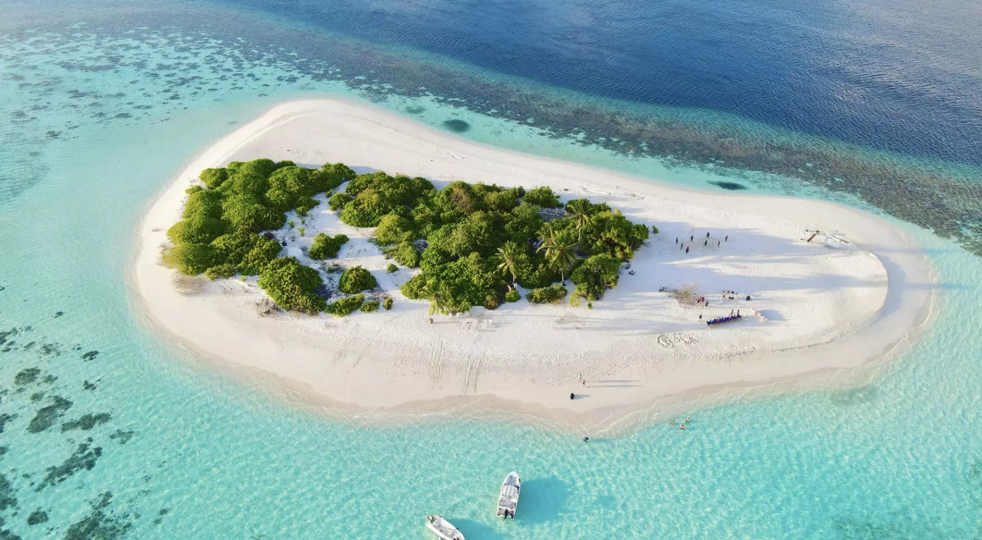 Aerial view of a white sand island in the morning