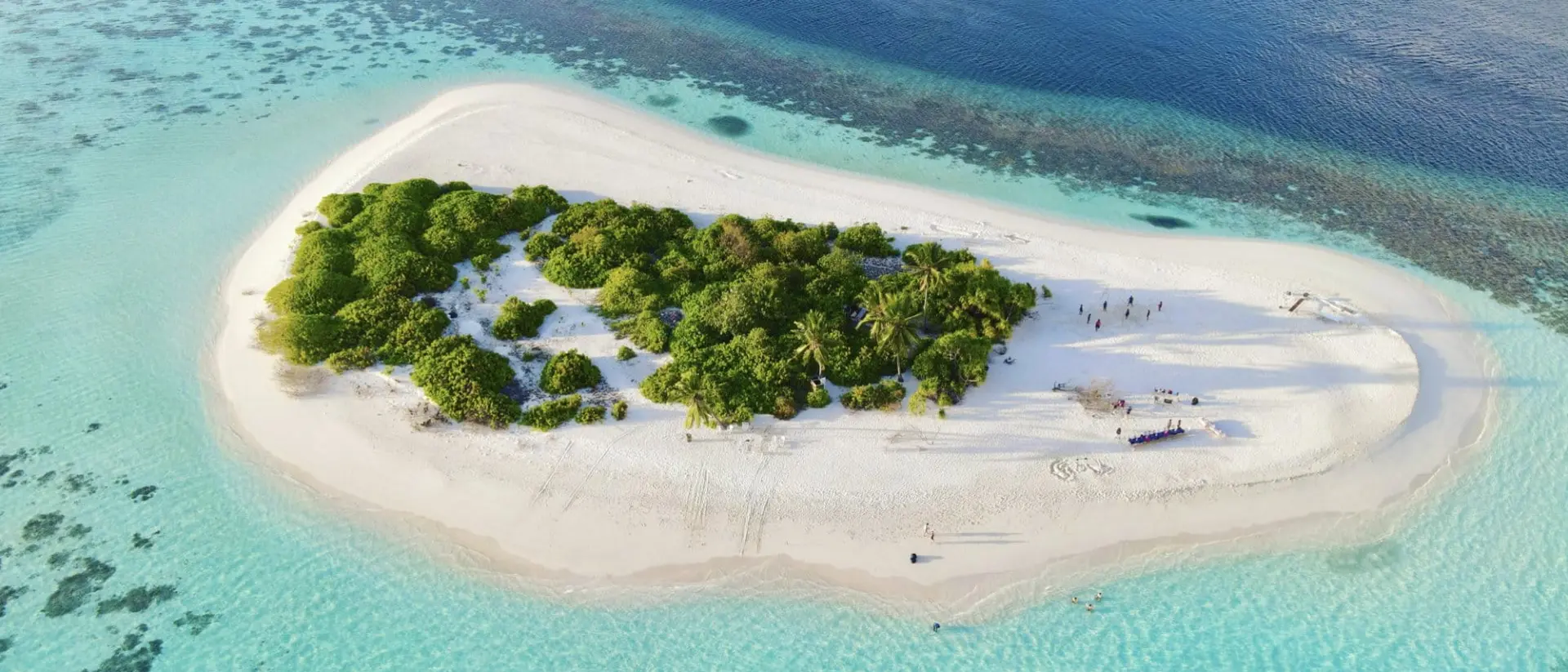 Aerial view of a white sand island in the morning
