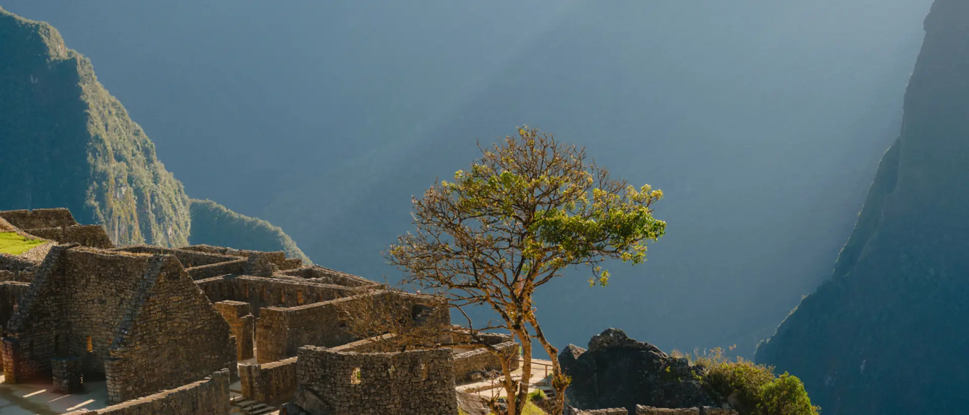 Morning view of Machu Picchu in the heights of the Andes Mountains in the Sacred Valley of the Incas in Peru.