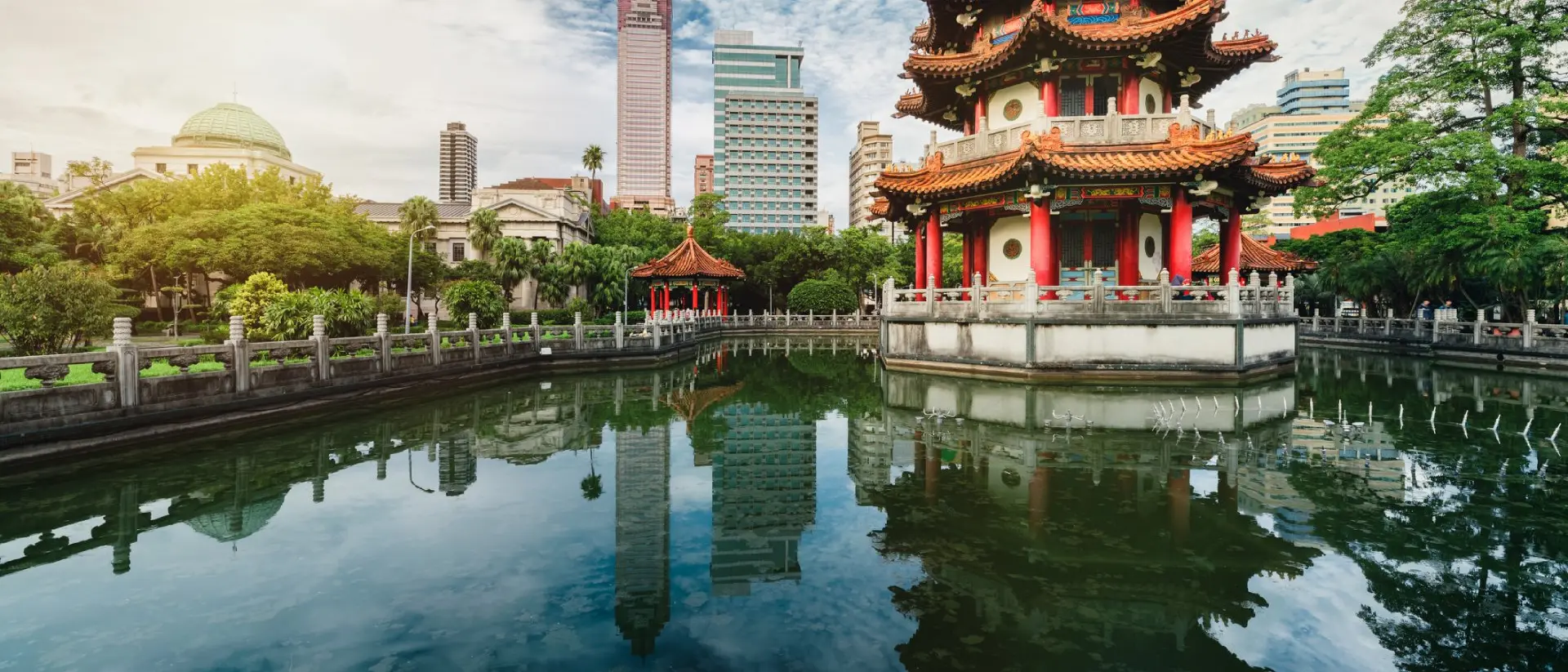 Sunset of 228 national park with modern building and pond reflection
