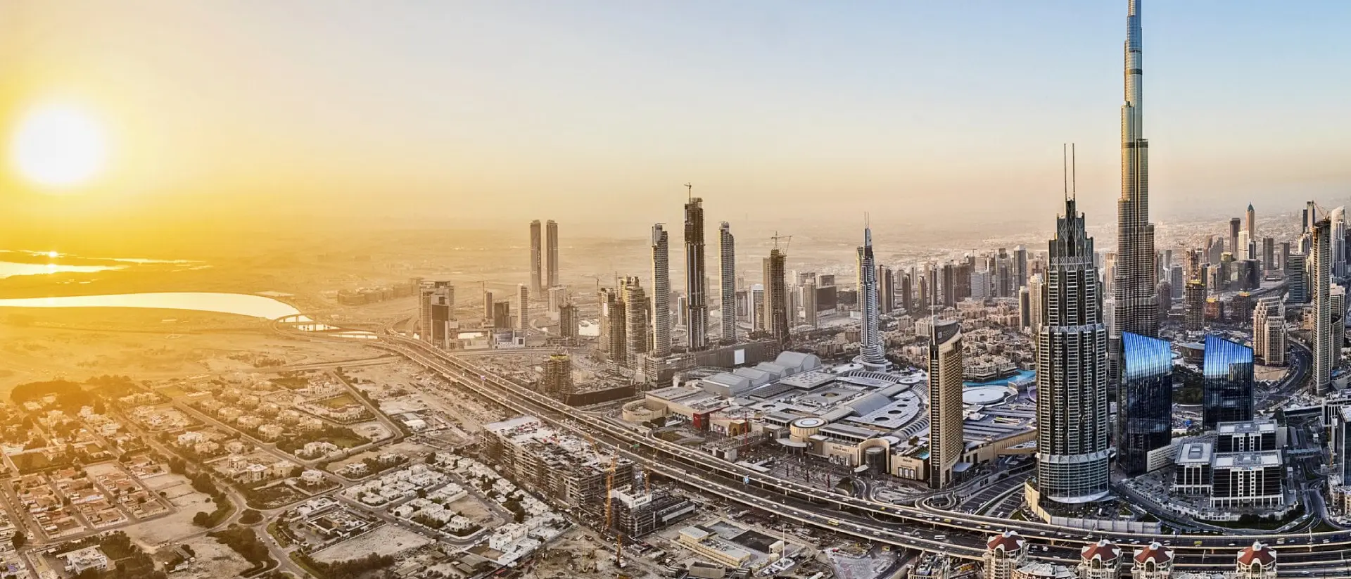 City lights in Dubai at sunrise