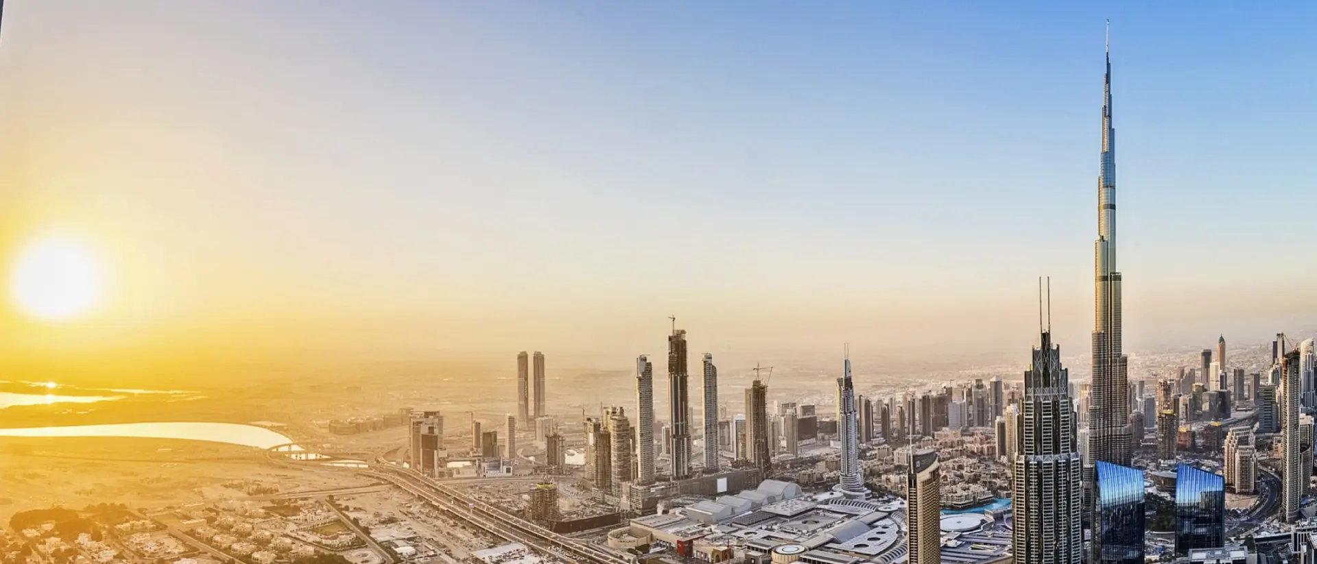 City lights in Dubai at sunrise