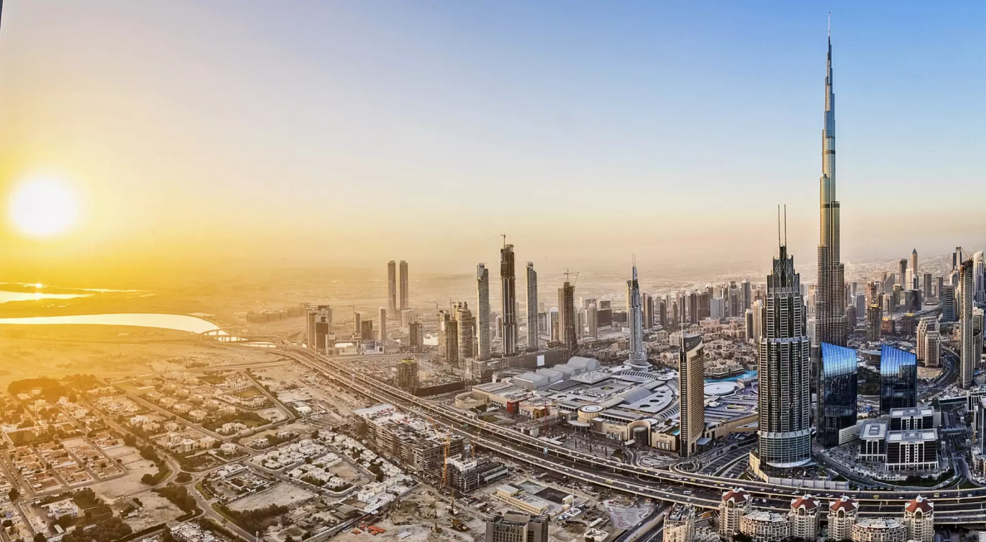 City lights in Dubai at sunrise