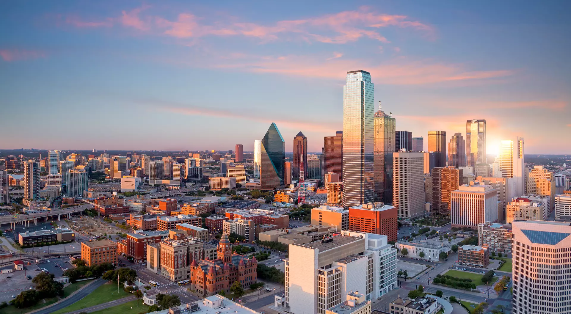 Dallas, Texas the city skyline of Dallas, Texas at sunset