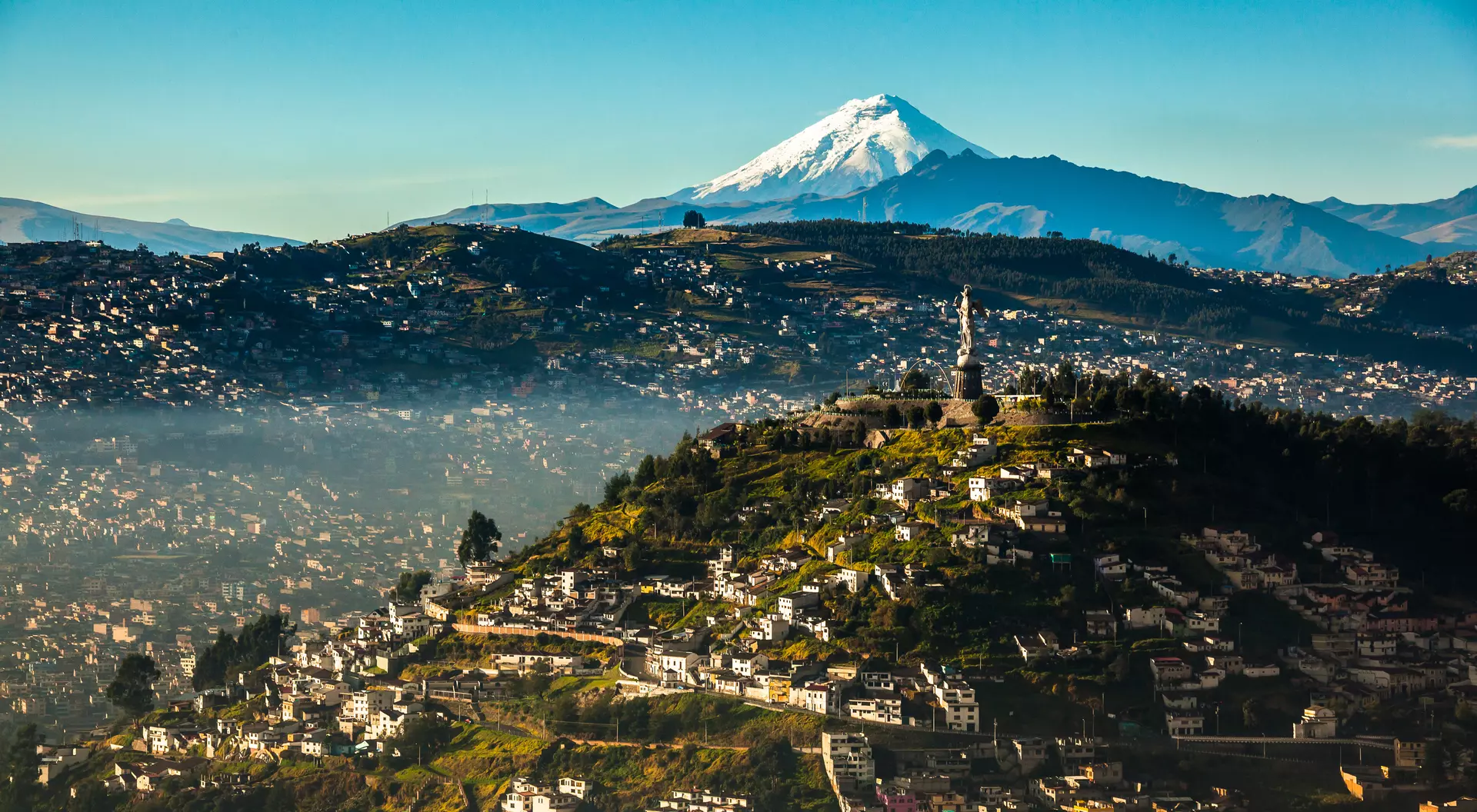 Capture the sight of El Panecillo from Quito
