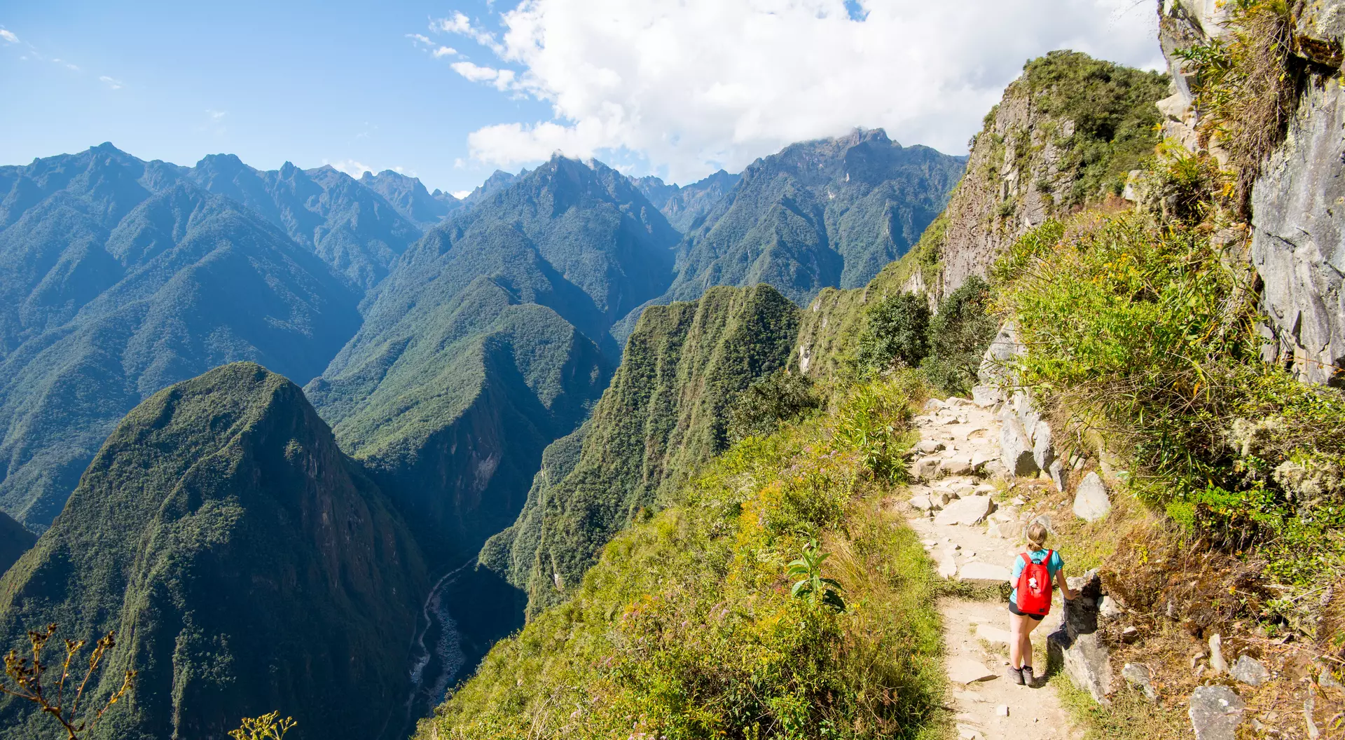Hiking on mountain stone road in Machu Picchu sun gate trail