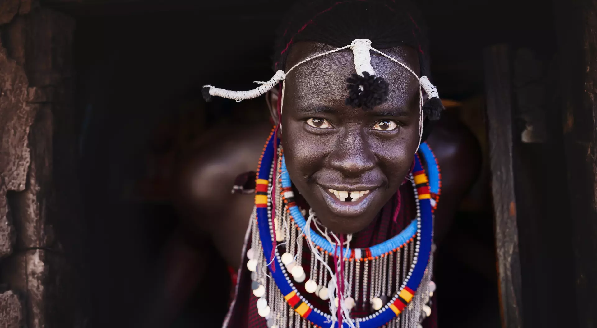 Portrait of Masai Mara man with traditional colorful necklace