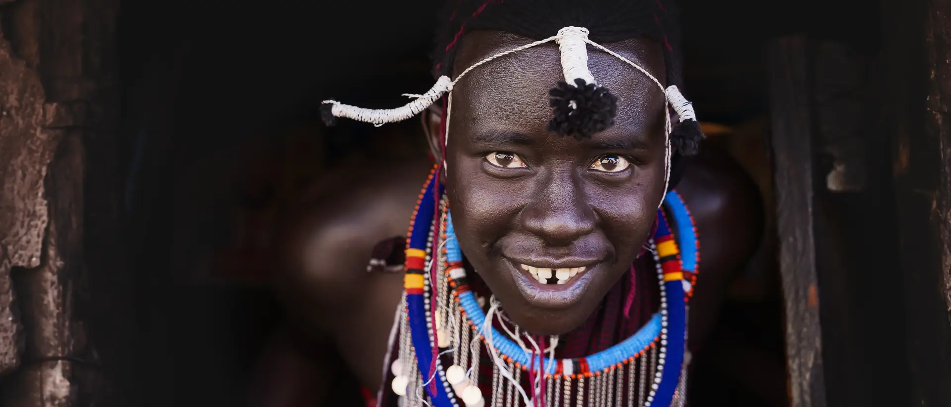 Portrait of Masai Mara man with traditional colorful necklace