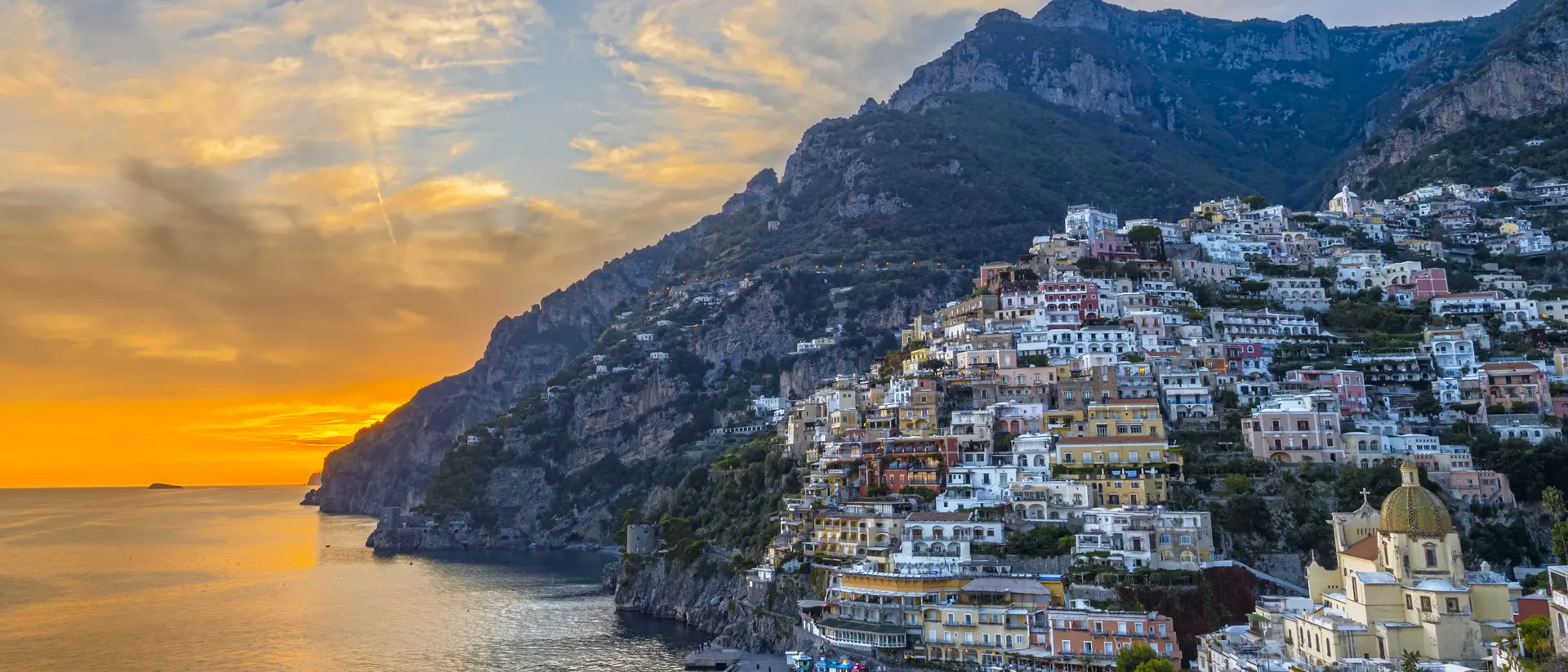 Positano, with it's pastel-hued houses clinging to the cliffside is the jewel of the A,alfi Coast