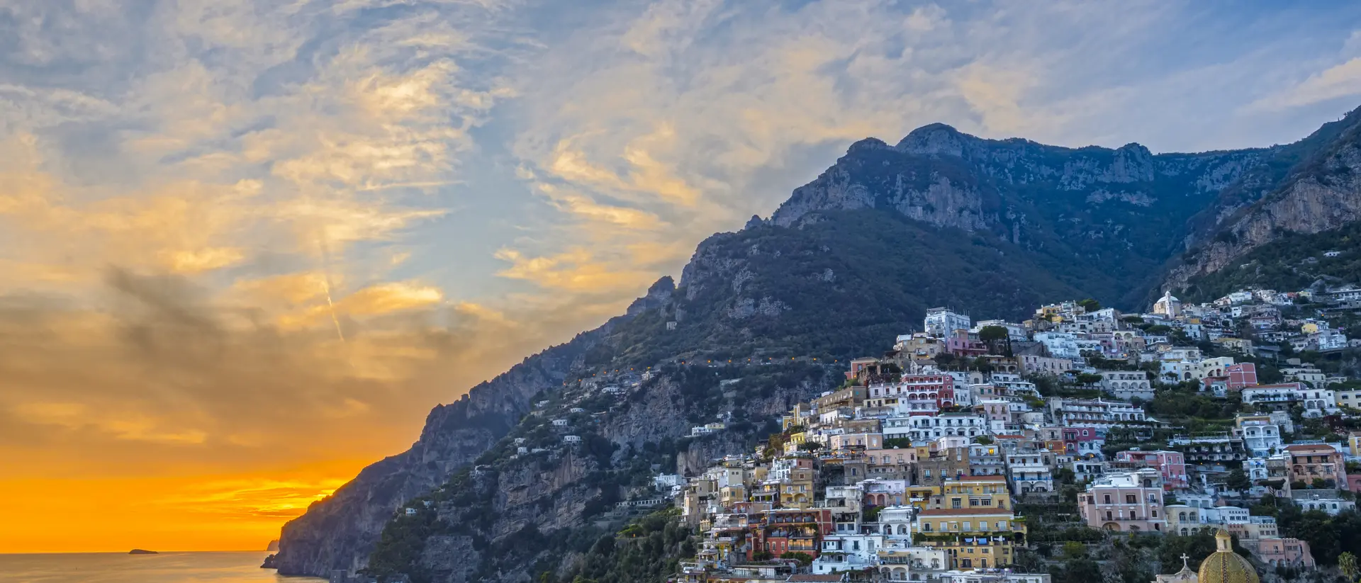 Positano, with it's pastel-hued houses clinging to the cliffside is the jewel of the A,alfi Coast