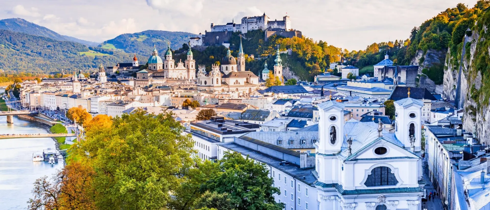 Salzburg skyline with Hohensalzburg castle and old town.