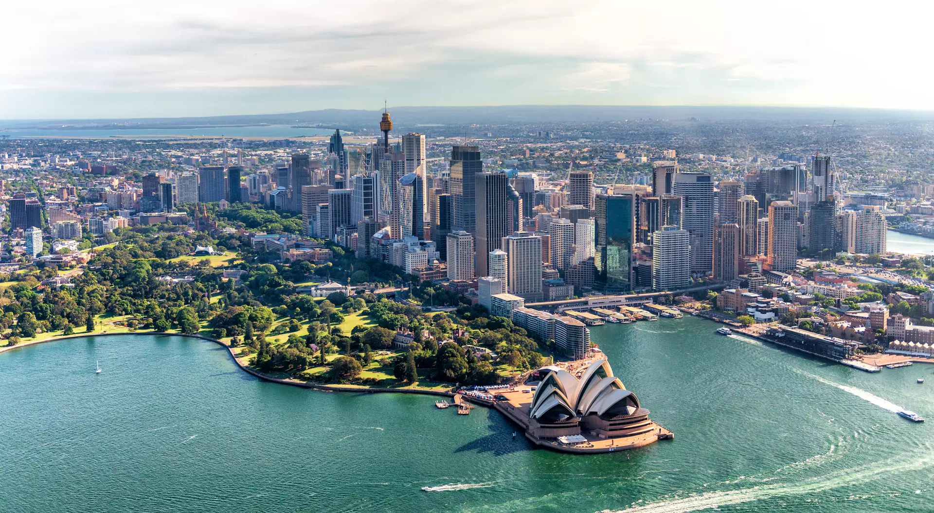 aerial view of harbour with opera house and skyline