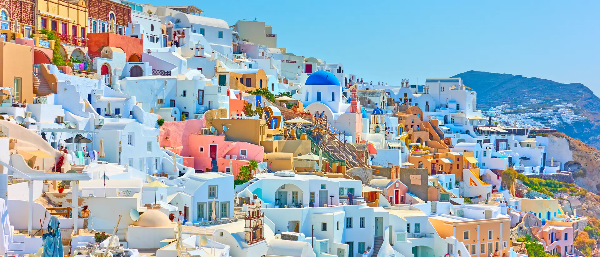 Colorful panoramia of Oia town in Santorini.