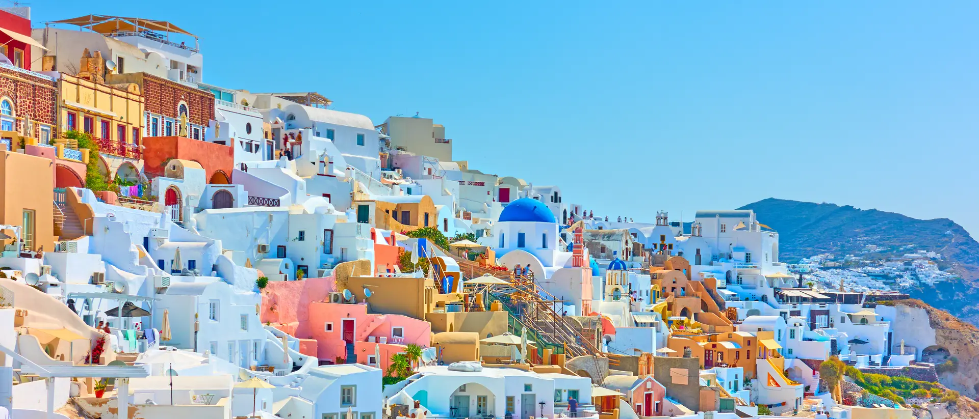 Colorful panoramia of Oia town in Santorini.