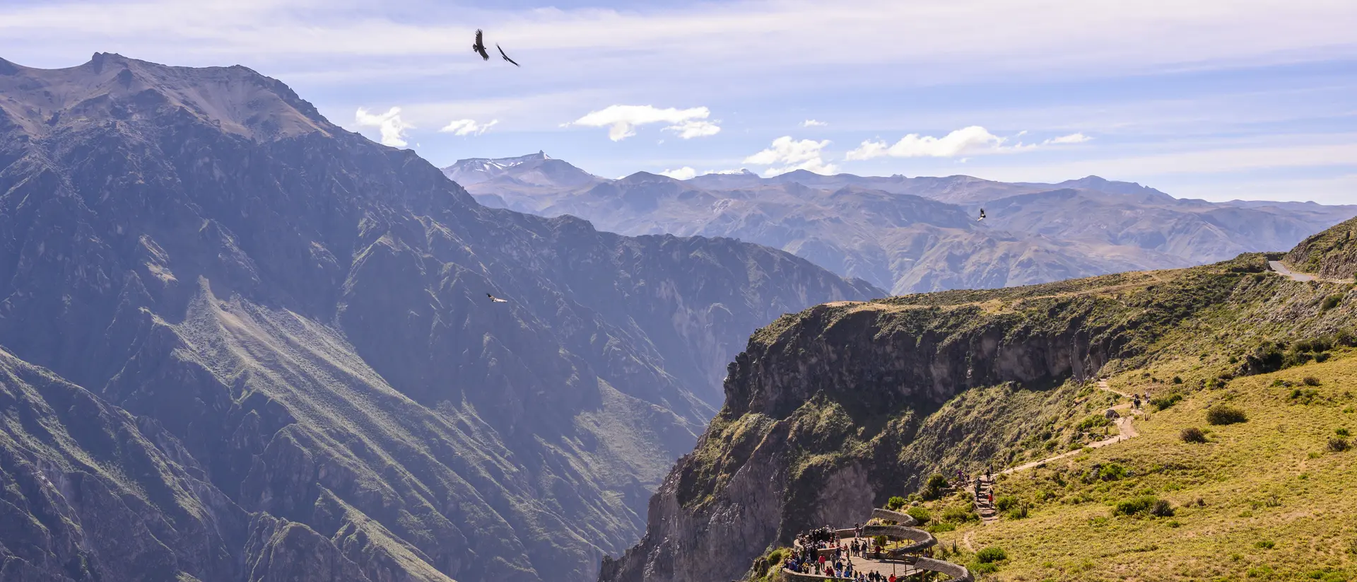 People watch for Andean Condors at Colca Canyon in Peru near the city of Arequipa