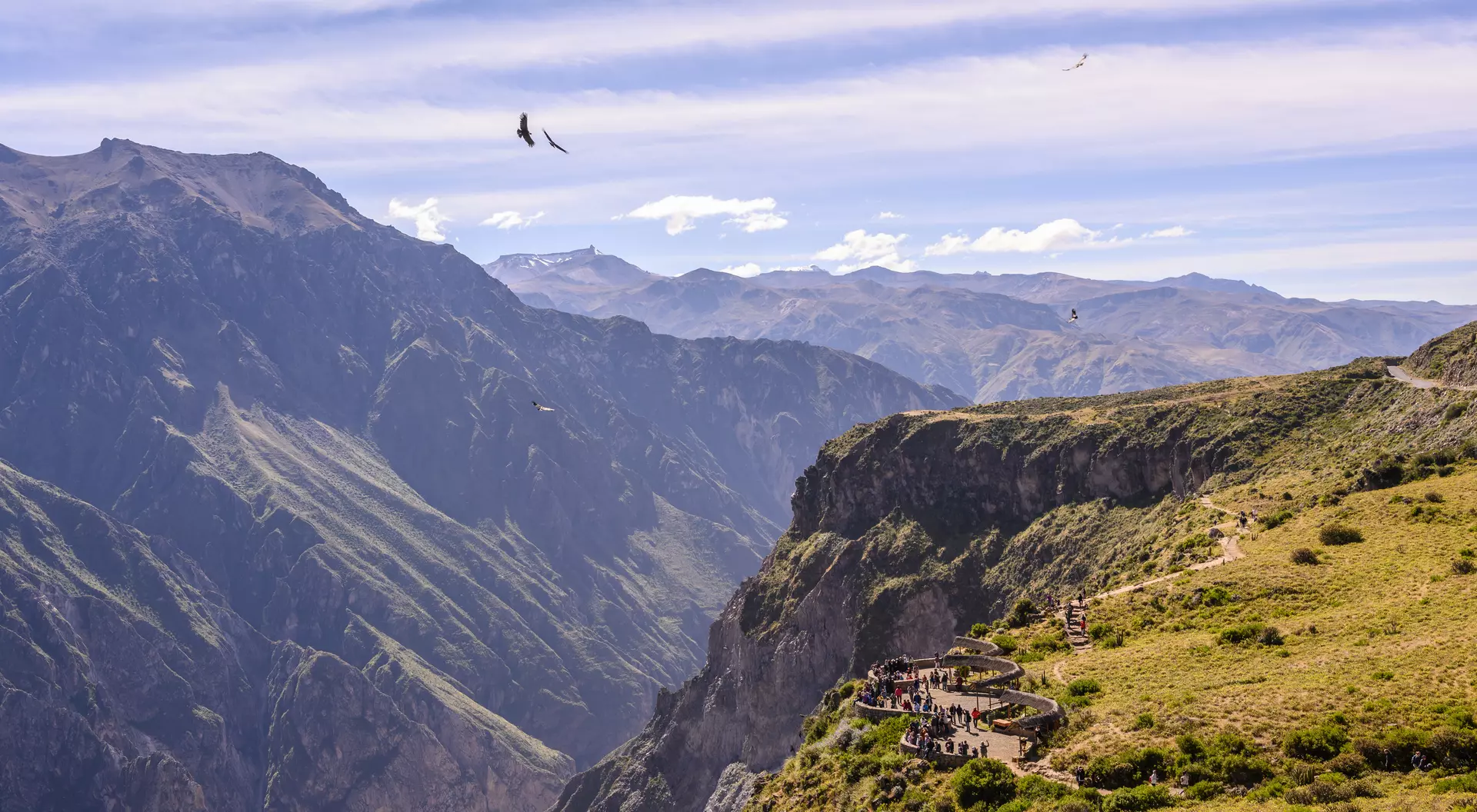 People watch for Andean Condors at Colca Canyon in Peru near the city of Arequipa
