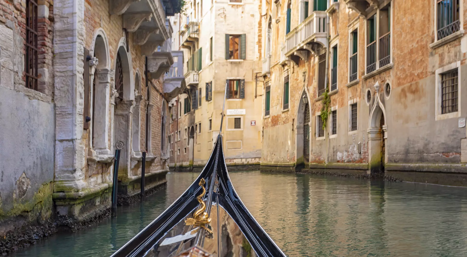 POV from a Gondola on a Canal in Venice, Italy