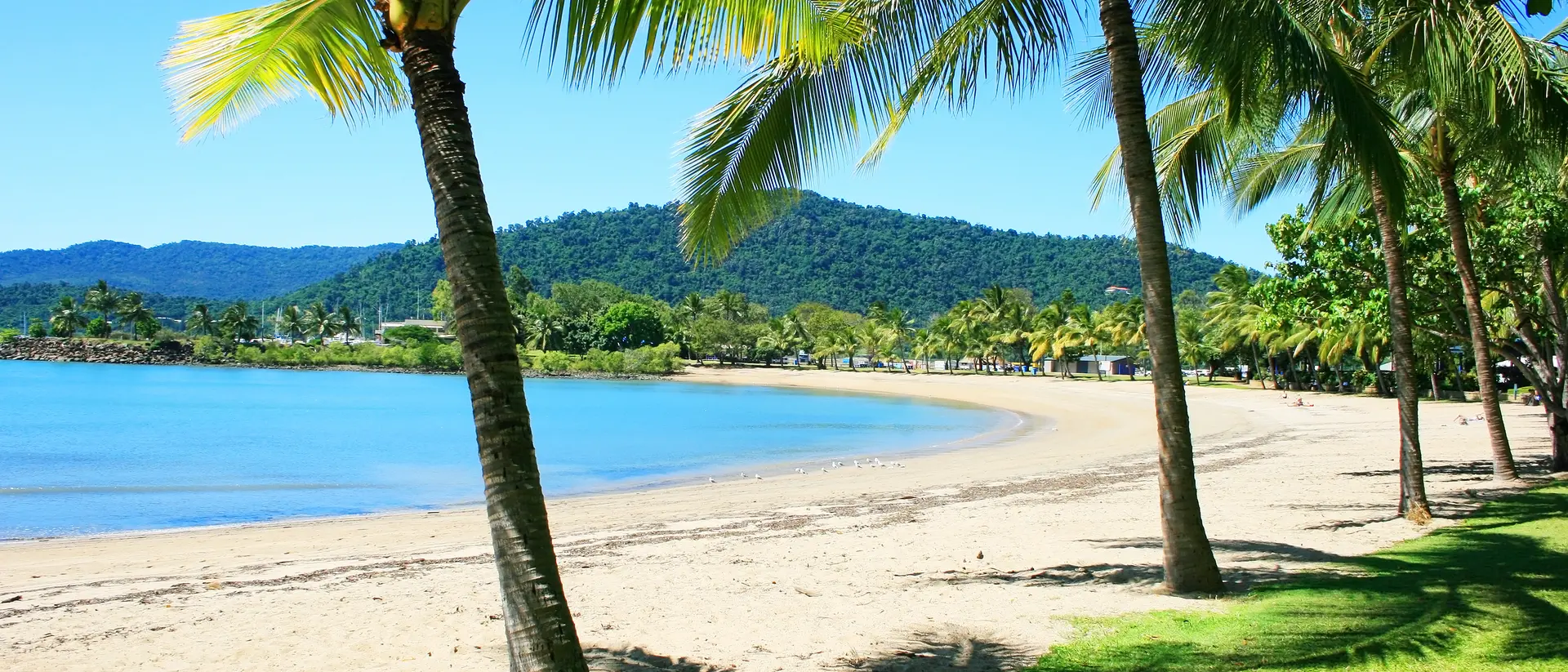 Rex Smeal Park in Port Douglas with tropical palm trees and beach, Australia
