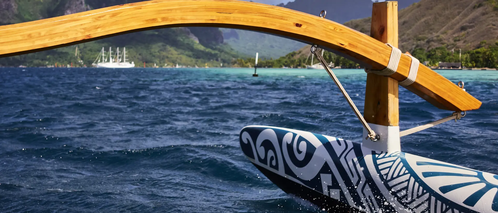 POV of boat speeding towards distant coastline.