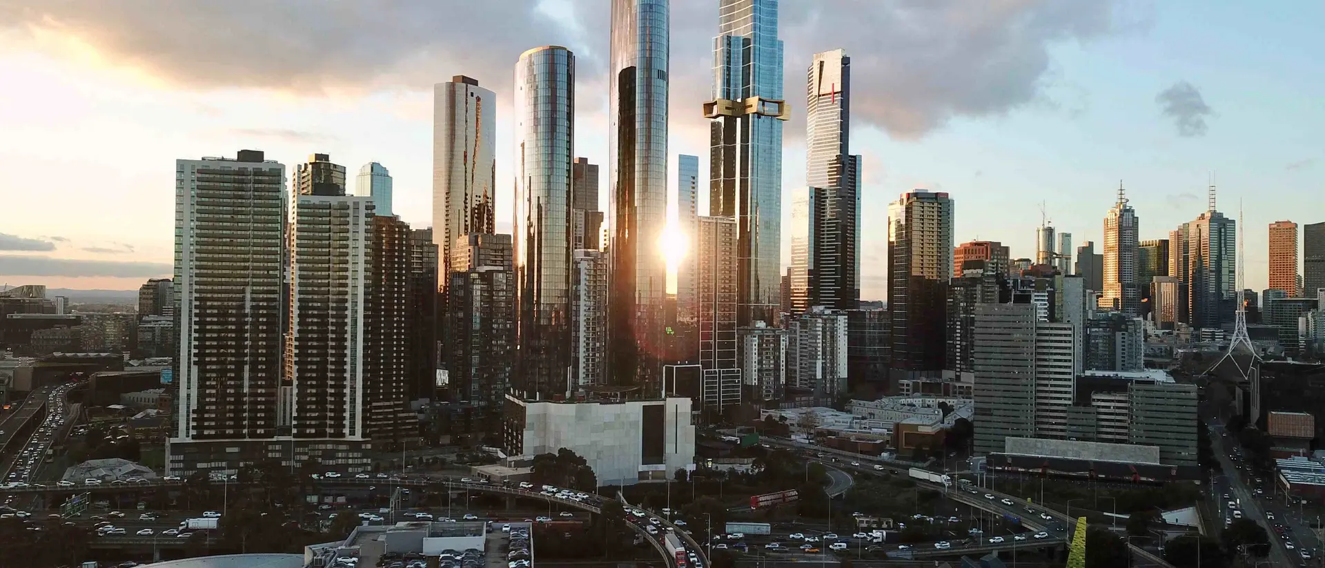 City skyscrapers with the sun setting behind