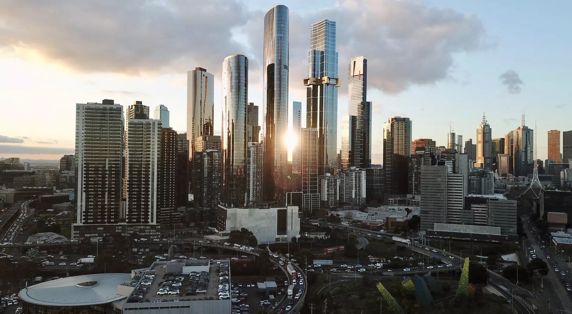 City skyscrapers with the sun setting behind