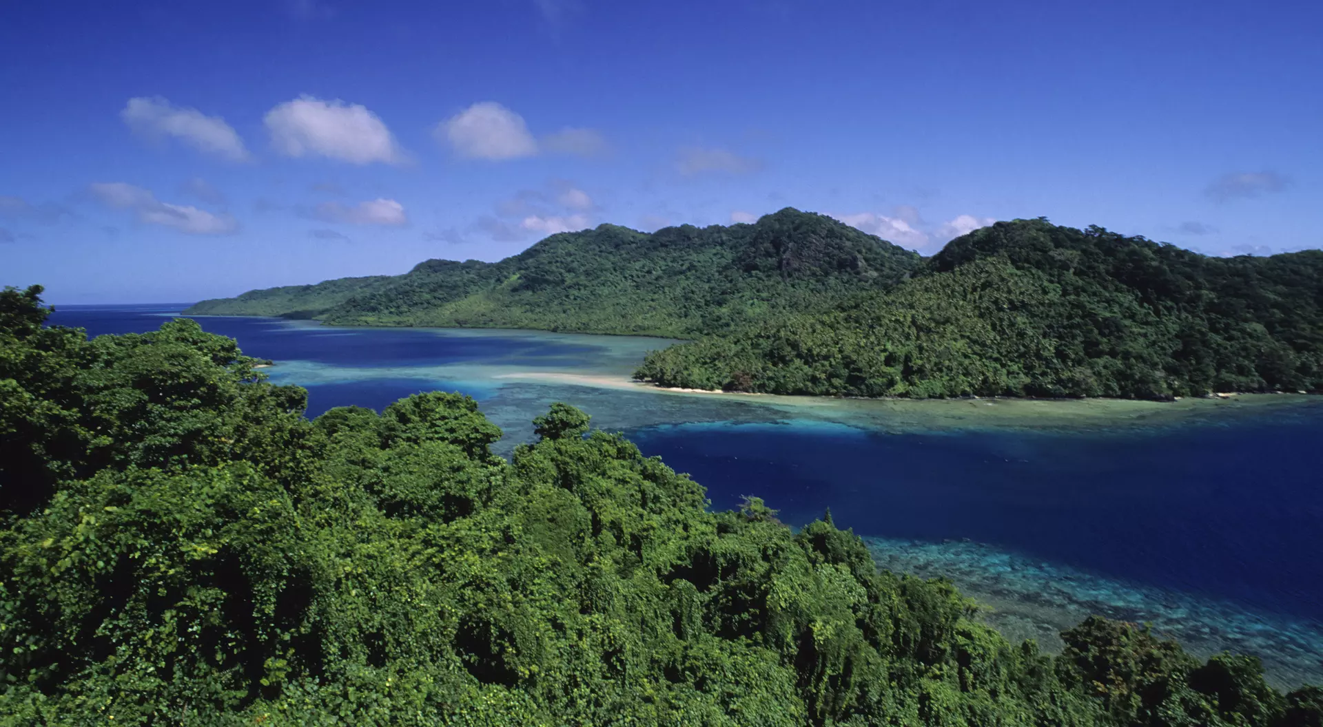 Channel of water surrounded by islands.