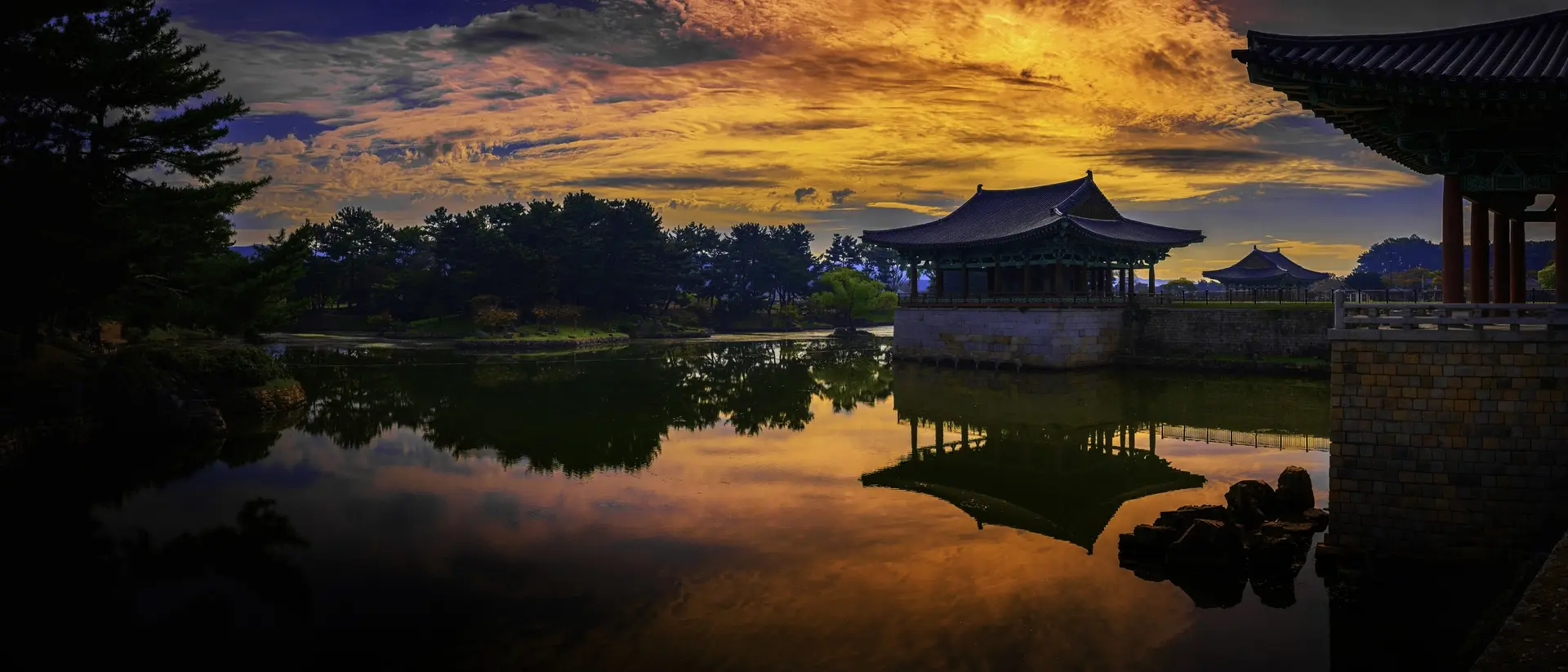 Gyeongju City Landmark Heritage Site in South Korea, of Donggung Palace, Wolji Pond and Anapji Park with traditional Korean architecture and garden at sunset