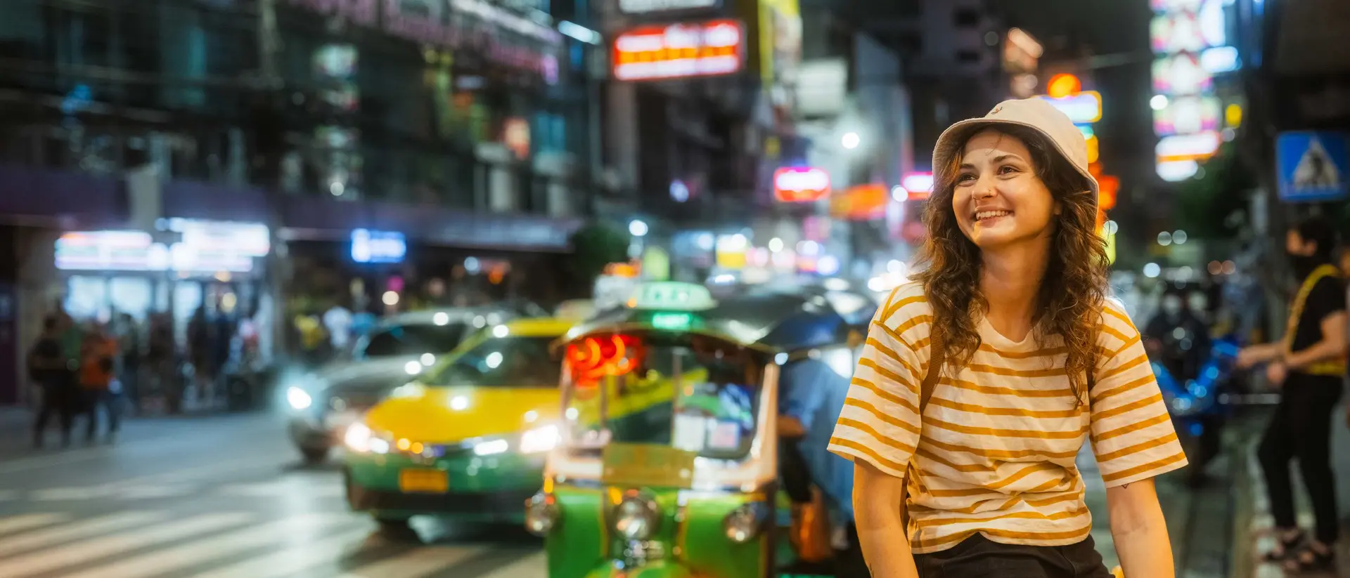Woman exploring Chinatown in Bangkok at night