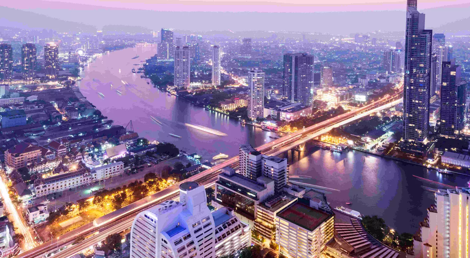 Aerial view of the Bangkok city skyline and the Chao Phraya River