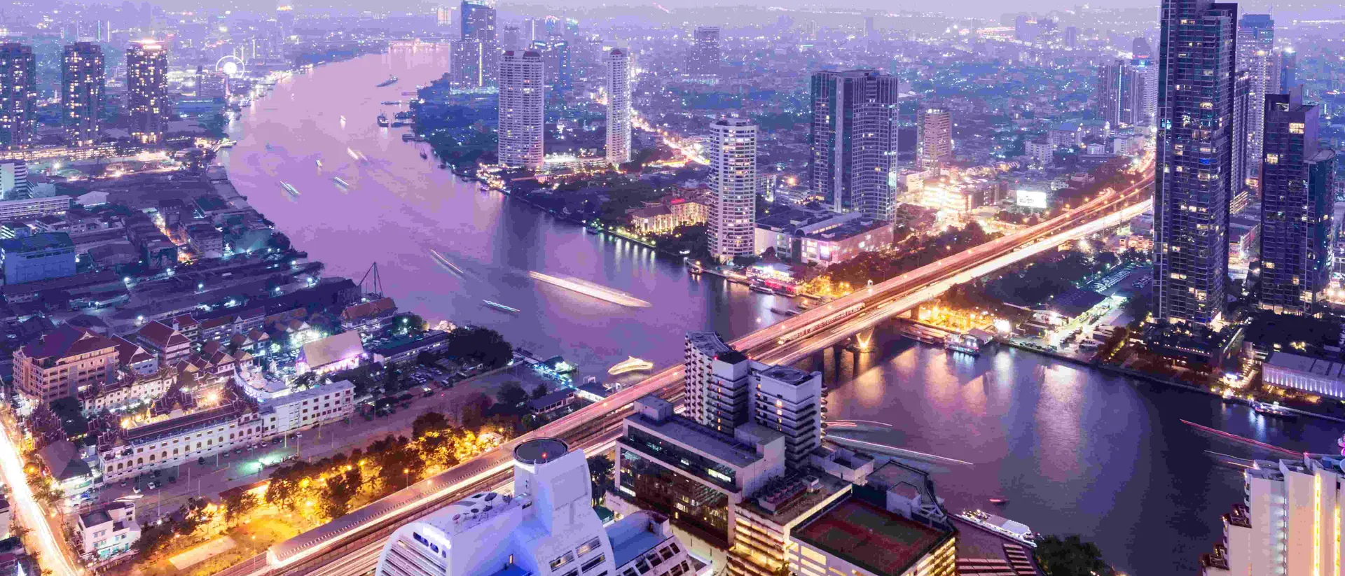Aerial view of the Bangkok city skyline and the Chao Phraya River
