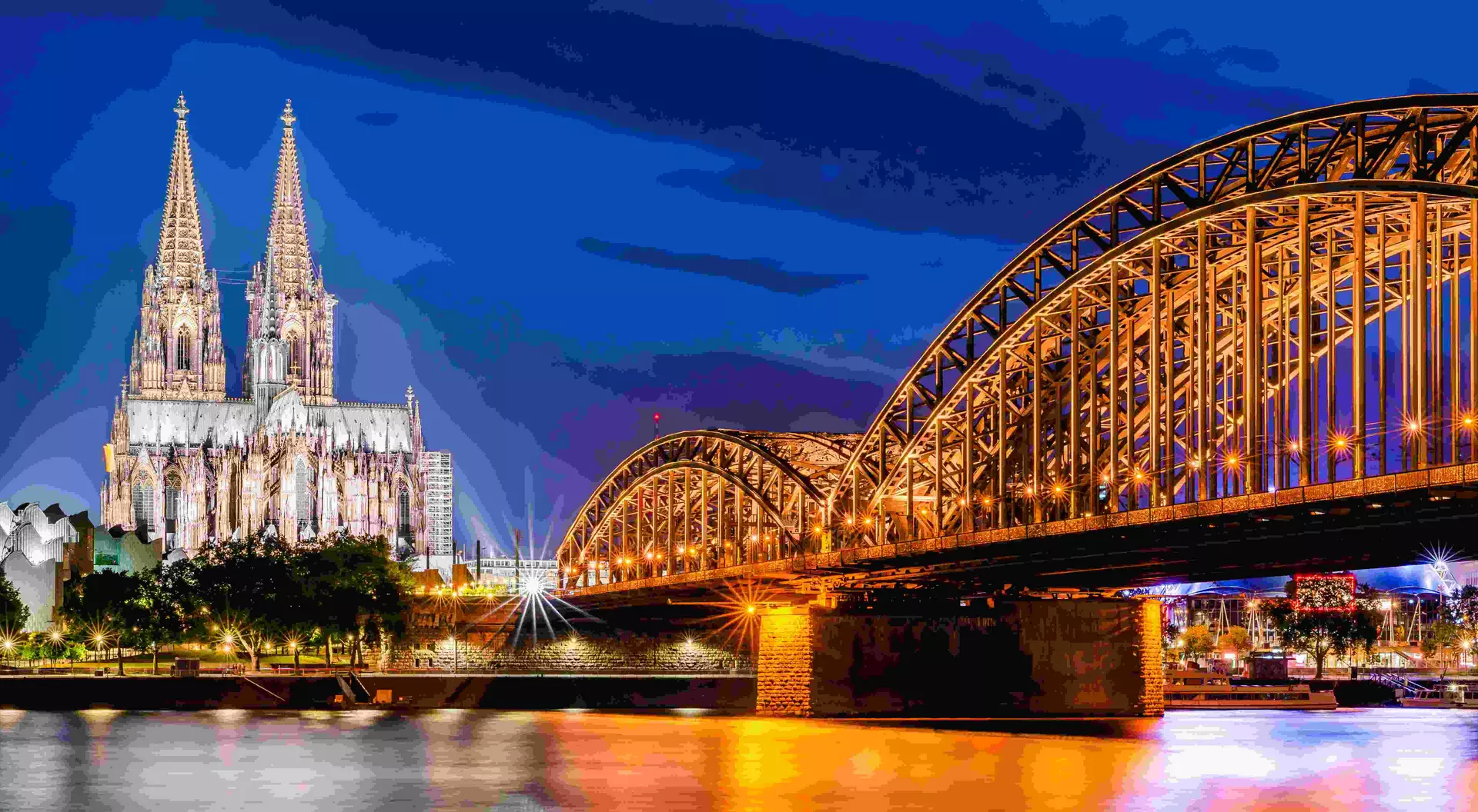 Cologne with Cologne Cathedral, Rhine and Hohenzollern Bridge at night