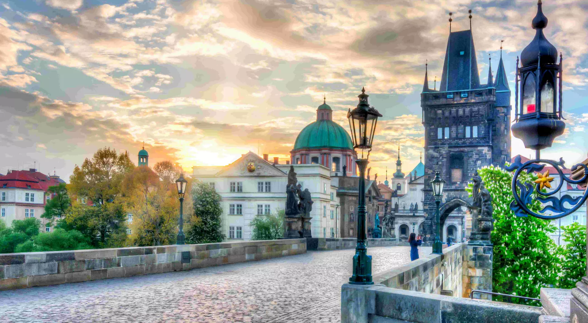 Charles Bridge (Karluv Most) at sunrise in Prague.
