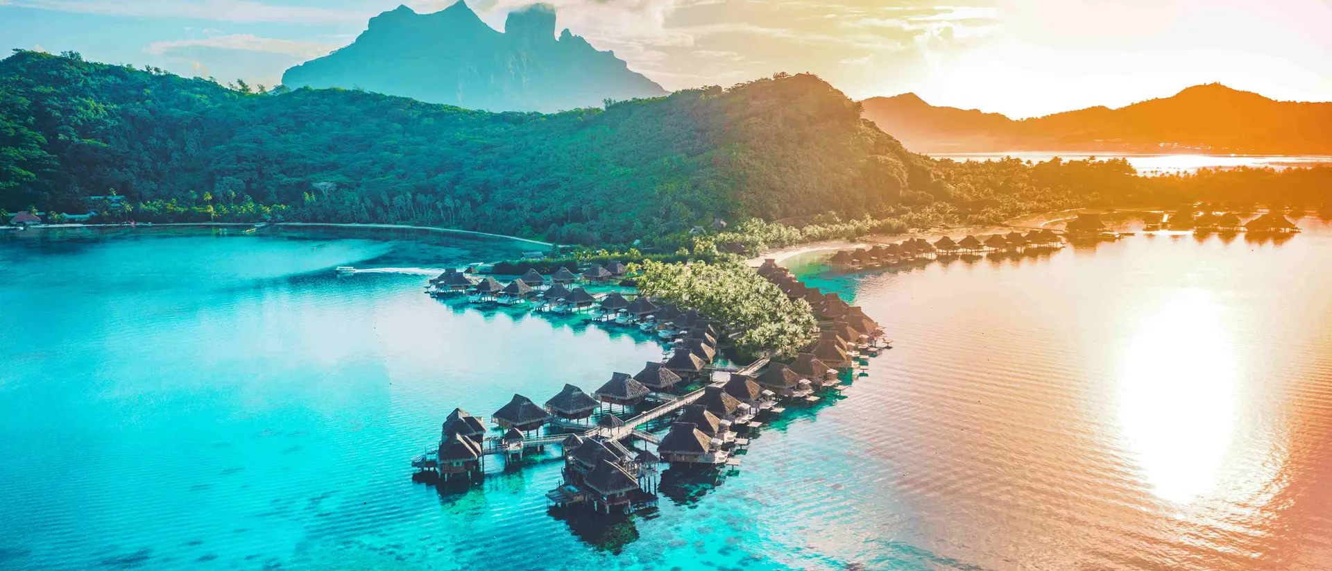 View from above at sunset of Bora Bora overwater bungalows, French Polynesia, Tahiti.