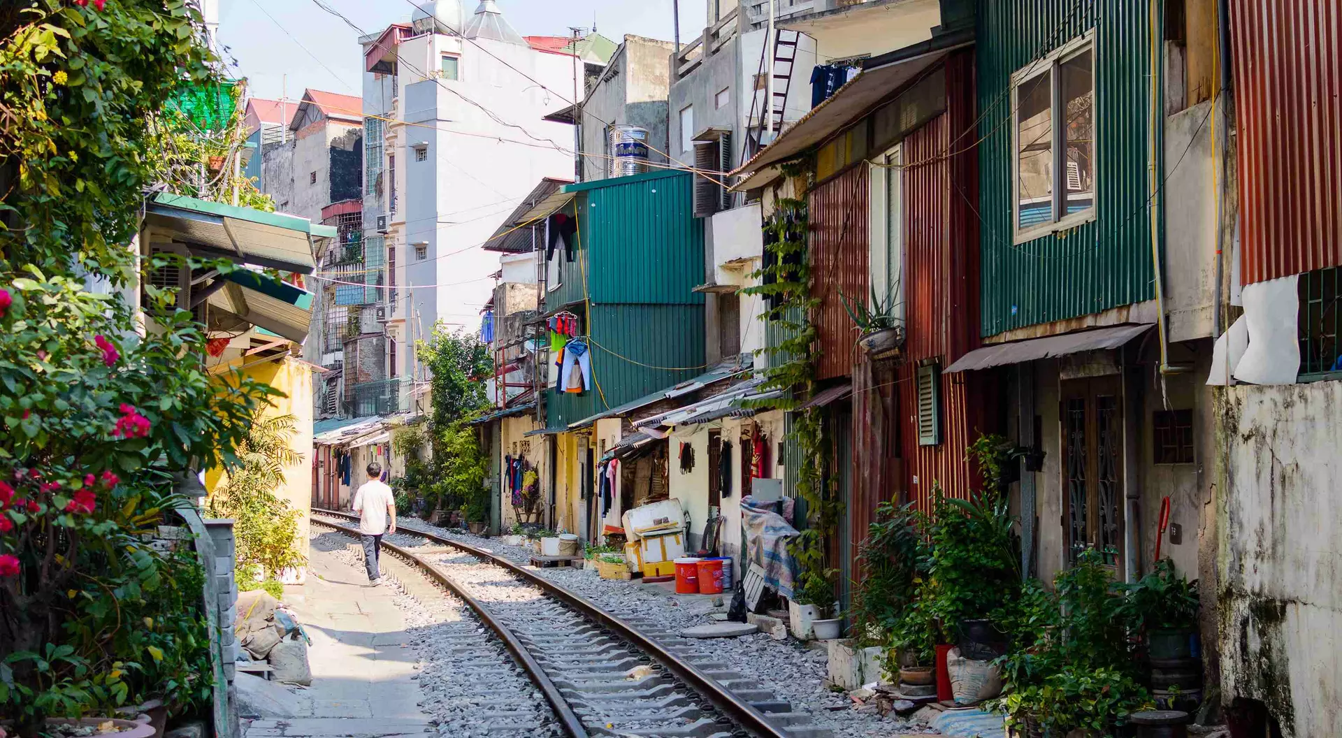 Railroad tracks on a street in the center of Hanoi, Vietnam.