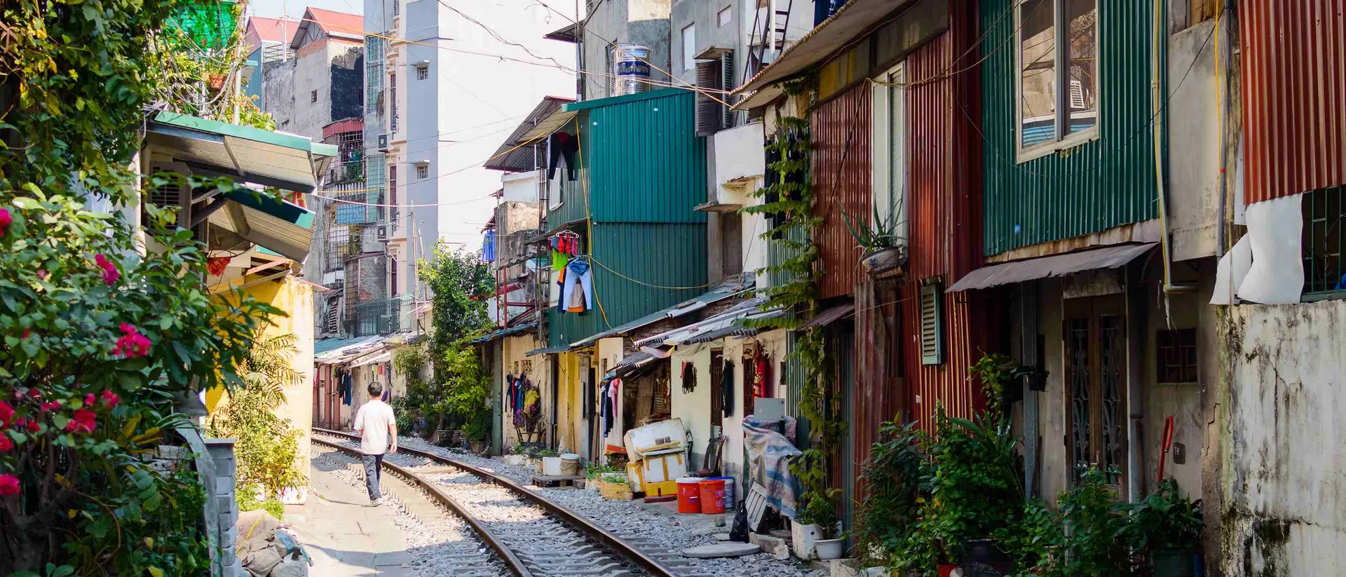 Railroad tracks on a street in the center of Hanoi, Vietnam.
