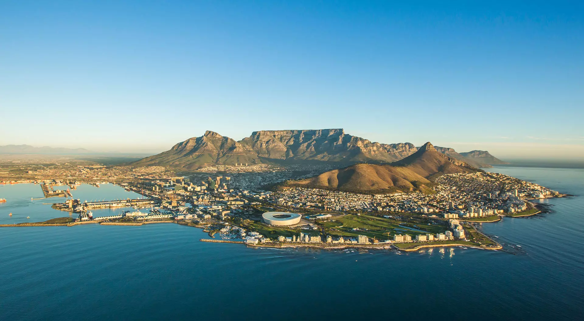 Aerial view of Cape Town on the edge of the Atlantic and Southern Oceans with Table Mountain as its backdrop
