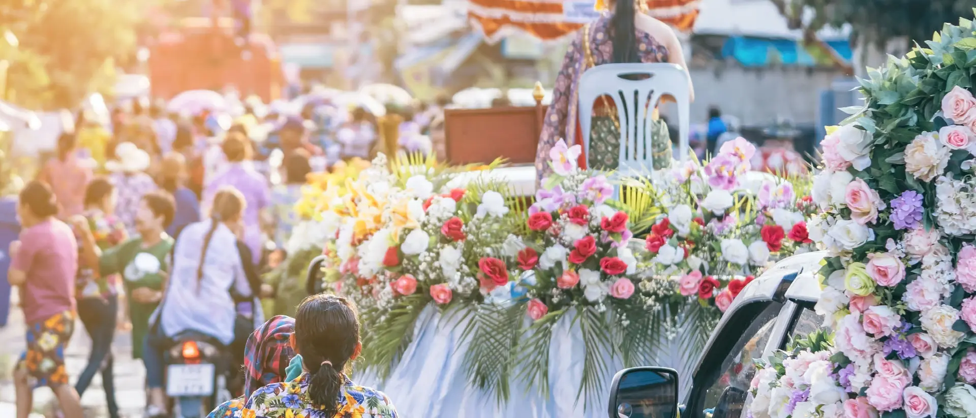 People dressed in festive gear for Thailand's songkran festival in Kanchanaburi