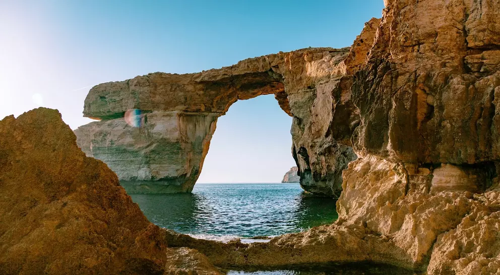 Azure window of the Gozo island - lime rock in a shape of arch (window) standing in the sea