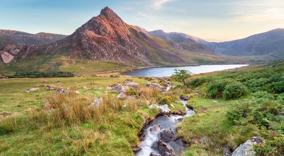 Evening light on Mount Tryfan above Llyn Ogwen in Snowdonia National Park in Wales