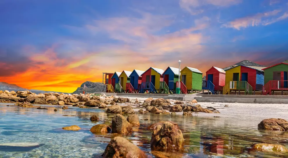 Muizenberg beach huts wooden cabins at twilight in Cape Town South Africa