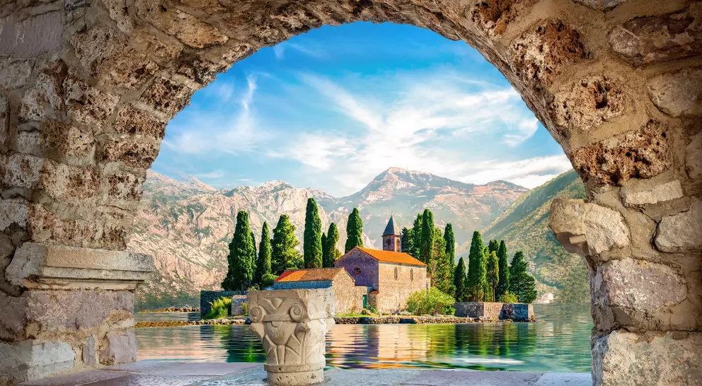 View on St George island from Our Lady of the Rocks through arch