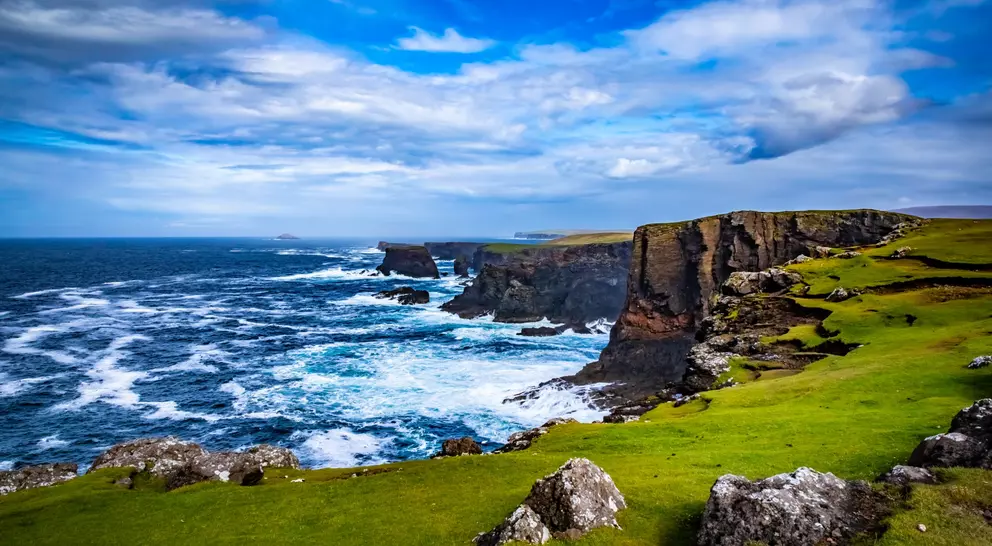 Views of archipelago cliffs and waves crashing