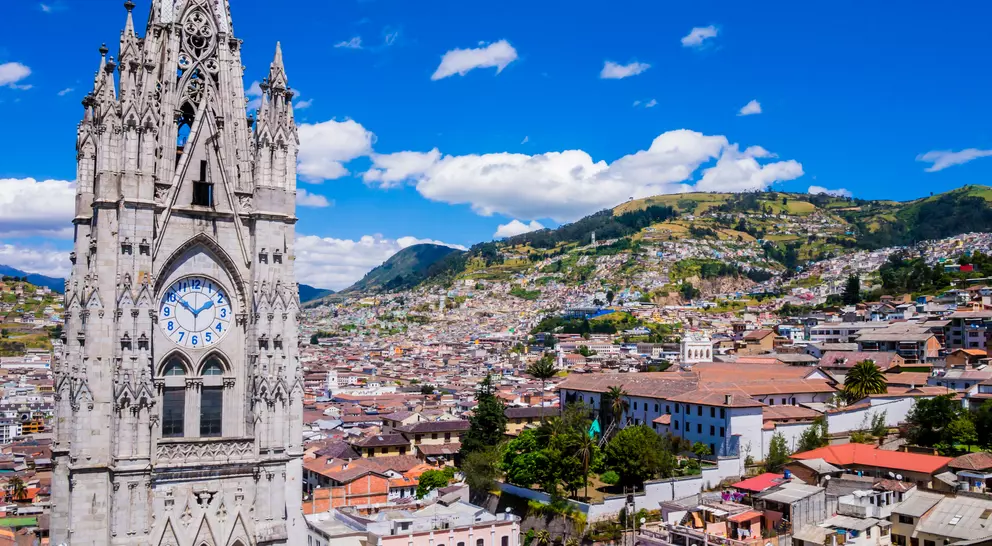 basilica in the old town of Quito against the backdrop of the hillside