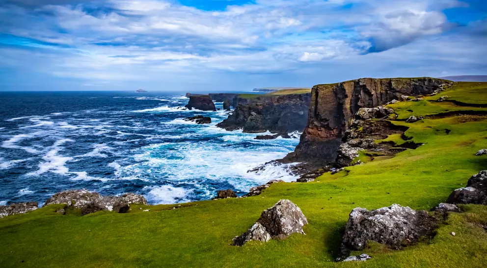 Views of archipelago cliffs and waves crashing