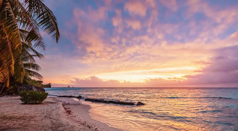 Colorful vibrant sunset over the pacific ocean at scenic natural beach