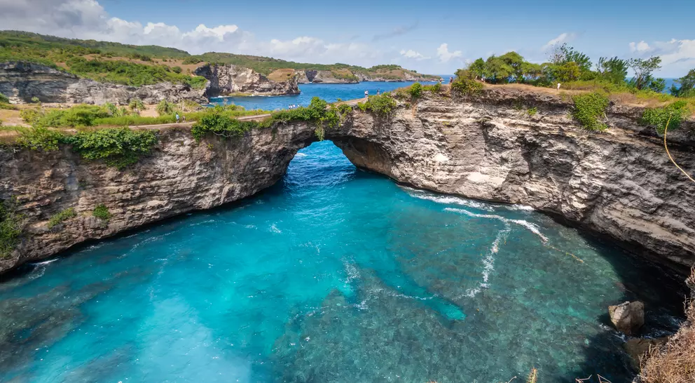 Stone arch over the sea called Broken beach on Nusa Penida ,Indonesia