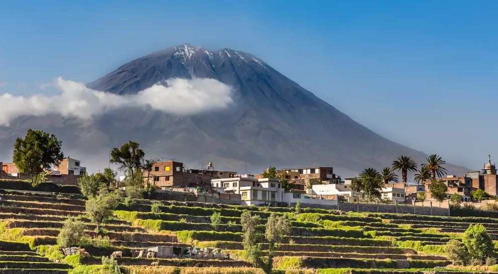 Dormant Misti Volcano over the fields and houses of peruvian city of Arequipa, Peru