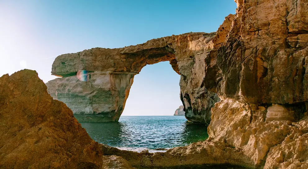 Azure window of the Gozo island - lime rock in a shape of arch (window) standing in the sea