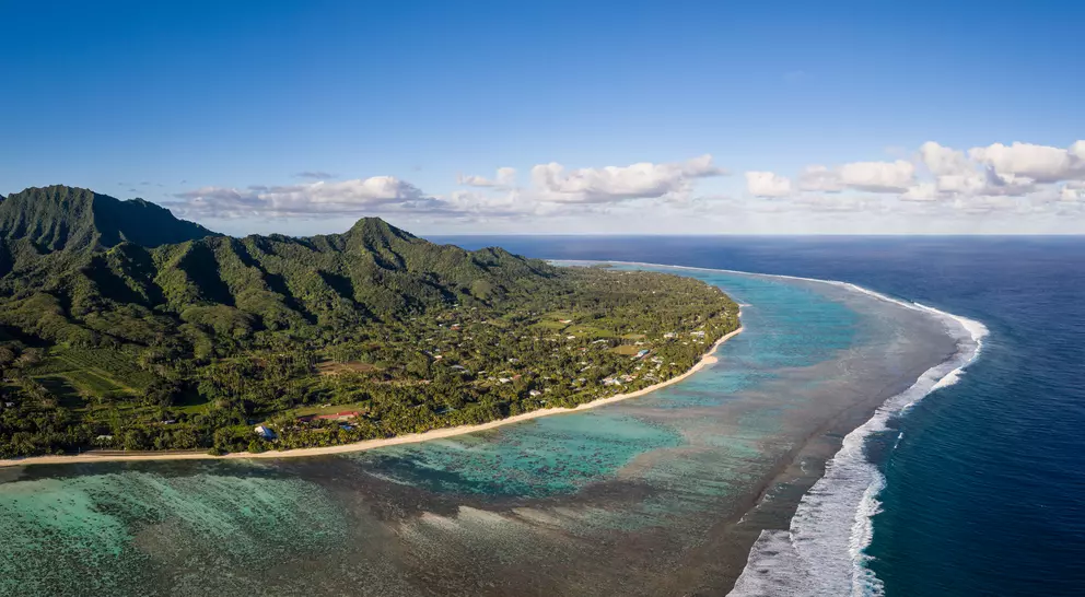 Rarotonga island, part of the Cook islands, in the Pacific ocean, with its jungle covered mountain and stunning beach