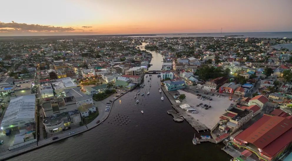 Evening sunset cityscape of Belize City with Caribbean Sea in background